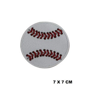 May include: White baseball patch with red stitching. The patch is 7 cm by 7 cm.