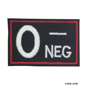 May include: White embroidered patch with a red border. The patch says "O-NEG" with a large white circle in the center.