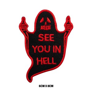 May include: Black and red embroidered iron-on patch of a ghost with outstretched arms and middle fingers raised. The ghost has a skull face and the text "See you in hell" in red.