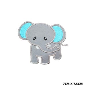 May include: An embroidered iron-on patch of a cartoon elephant with blue ears. The elephant is 7 cm by 7.5 cm.