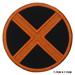 May include: Orange embroidered X on a black background. The patch is circular and measures 7.7 cm in diameter.