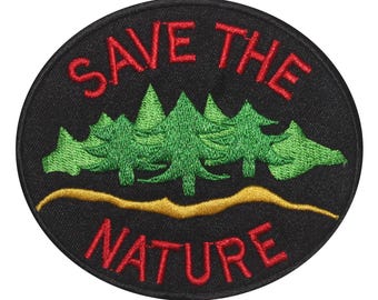 May include: A black circular patch with red embroidered text that reads "SAVE THE NATURE" and a green embroidered image of a row of pine trees with a gold embroidered line beneath them. The patch measures 8.5 cm by 10 cm.