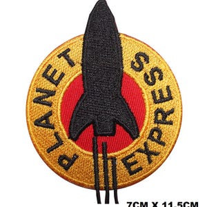 May include: A gold and red embroidered patch featuring a black rocket ship and the text "Planet Express" in a circle. The patch measures 7 cm by 11.5 cm.