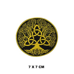 May include: A yellow embroidered patch of a tree of life with a Celtic knot design on a black background. The patch is 7 cm by 7 cm.