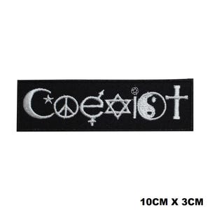 May include: Black embroidered patch with the word "Coexist" in white lettering. The word is surrounded by symbols representing different religions, including a crescent moon and star, a peace sign, a yin-yang symbol, a Star of David, and a cross. The patch measures 10 cm by 3 cm.