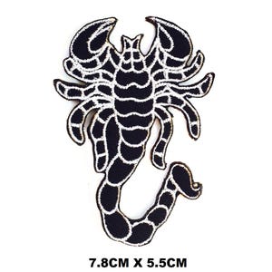 May include: Black and white scorpion iron-on patch with a detailed design. The patch measures 7.8 inches by 5.5 inches.