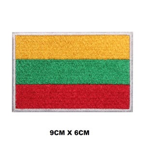 May include: Embroidered patch of the Lithuanian flag. The flag is yellow, green, and red with a white border. The patch is 9 inches by 6 inches.