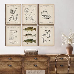 Set of 12 Vintage Fishing Patent Prints, featuring Trout and Bass fishing art. Includes Male Brook Trout, Lake Trout, Rocky Mountain Trout, Largemouth, Smallmouth, and Striped Bass. Showcasing vintage fishing patents with detailed illustrations of fishing gear, tackle, lures, reels, and a tackle box. Ideal for fishing enthusiasts, anglers, and man cave decor. Perfect for lake house walls or as a unique fishing gift. Classic, freshwater fishing and North American game fish.