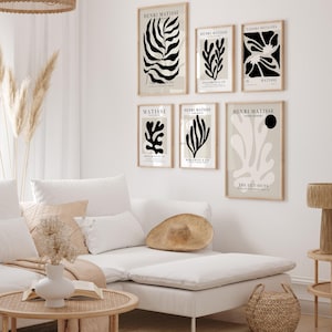 Set of 12 Henri Matisse inspired printable posters in striking black and beige tones, featuring minimalist abstract forms, geometric modern art, and subtle abstract flowers. This mid century modern Matisse gallery wall set combines bold black shapes with warm beige backgrounds for a refined, timeless look. Ideal for minimalist black art lovers, neutral boho interiors, and modern spaces, these coordinated prints bring balance and artistic character to living rooms, bedrooms, offices, or entryways
