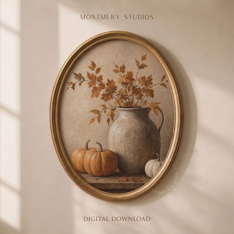 Muted pumpkin still life printable wall art, featuring orange pumpkins, a white pumpkin, rustic ceramic vase, and dried autumn leaves on a wooden table. Warm neutral fall painting for farmhouse decor, Thanksgiving wall art, fall kitchen print, mantel styling, rustic autumn decor, and cozy seasonal home decor.