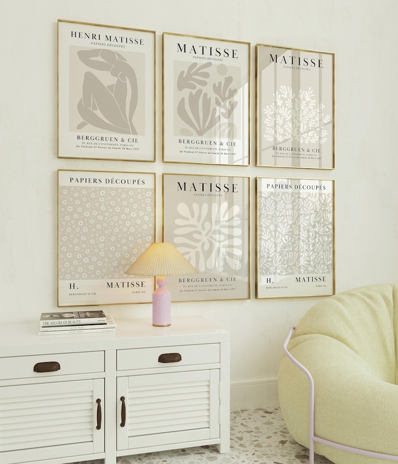 Set of 12 beige Henri Matisse inspired posters featuring abstract botanical shapes, geometric floral forms, and modern cut-out style designs. This neutral boho art collection uses soft beige tones and minimalist lines, making it ideal for a modern gallery wall, or mid-century modern home decor. Elegant abstract flowers and geometric modern art prints create a cohesive, calm aesthetic for living rooms, bedrooms, and stylish interiors.