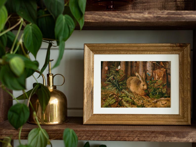 Vintage rabbit art print featuring a bunny in a forest scene, perfect for spring and Easter decor. Antique wildlife artwork with rustic nature charm, ideal for forest animal decor, nature-inspired wall art, and vintage bunny prints for home and cabin