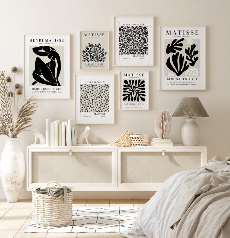 Set of 12 Henri Matisse inspired printable posters in striking black and beige tones, featuring minimalist abstract forms, geometric modern art, and subtle abstract flowers. This mid century modern Matisse gallery wall set combines bold black shapes with warm beige backgrounds for a refined, timeless look. Ideal for minimalist black art lovers, neutral boho interiors, and modern spaces, these coordinated prints bring balance and artistic character to living rooms, bedrooms, offices, or entryways