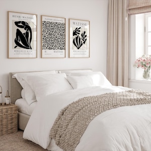 Set of 12 Henri Matisse inspired printable posters in striking black and beige tones, featuring minimalist abstract forms, geometric modern art, and subtle abstract flowers. This mid century modern Matisse gallery wall set combines bold black shapes with warm beige backgrounds for a refined, timeless look. Ideal for minimalist black art lovers, neutral boho interiors, and modern spaces, these coordinated prints bring balance and artistic character to living rooms, bedrooms, offices, or entryways