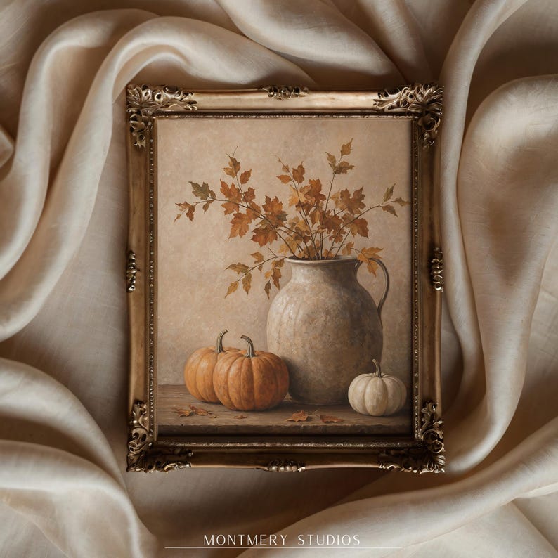 Muted pumpkin still life printable wall art, featuring orange pumpkins, a white pumpkin, rustic ceramic vase, and dried autumn leaves on a wooden table. Warm neutral fall painting for farmhouse decor, Thanksgiving wall art, fall kitchen print, mantel styling, rustic autumn decor, and cozy seasonal home decor.