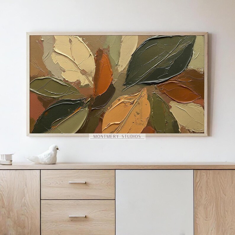 Abstract Fall Leaves TV Art featuring textured painting details in earthy brown and muted green tones. Perfect as seasonal autumn wall decor or Thanksgiving TV art, this boho autumn art creates a warm rustic ambiance for farmhouse living rooms or modern earthy interiors. A unique textured fall painting, ideal as fall frame TV art to bring cozy seasonal charm and natural beauty into your home during the autumn months.