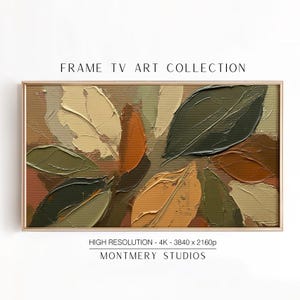 May include: A framed artwork featuring an abstract painting of leaves in shades of green, beige, and orange. The textured brushstrokes create a three-dimensional effect. The frame is a light gold color. Text at the top reads "FRAME TV ART COLLECTION".