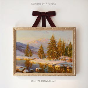 May include: A framed landscape painting of a snowy winter scene with evergreen trees, a river, and mountains. The painting is in a gold ornate frame and is suspended by a burgundy ribbon. The text "MONTEMERY STUDIOS" and "DIGITAL DOWNLOAD" are visible.