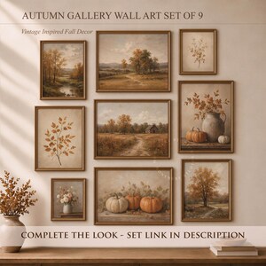 Muted pumpkin still life printable wall art, featuring orange pumpkins, a white pumpkin, rustic ceramic vase, and dried autumn leaves on a wooden table. Warm neutral fall painting for farmhouse decor, Thanksgiving wall art, fall kitchen print, mantel styling, rustic autumn decor, and cozy seasonal home decor.