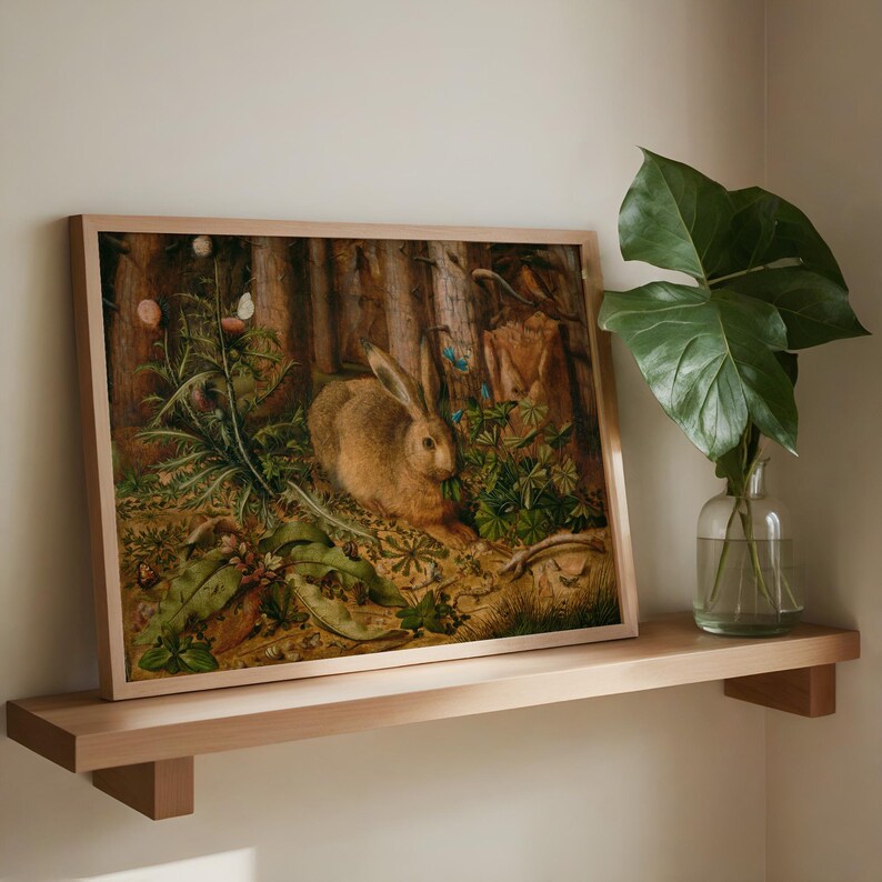 Vintage rabbit art print featuring a bunny in a forest scene, perfect for spring and Easter decor. Antique wildlife artwork with rustic nature charm, ideal for forest animal decor, nature-inspired wall art, and vintage bunny prints for home and cabin