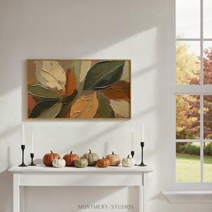 Abstract Fall Leaves TV Art featuring textured painting details in earthy brown and muted green tones. Perfect as seasonal autumn wall decor or Thanksgiving TV art, this boho autumn art creates a warm rustic ambiance for farmhouse living rooms or modern earthy interiors. A unique textured fall painting, ideal as fall frame TV art to bring cozy seasonal charm and natural beauty into your home during the autumn months.