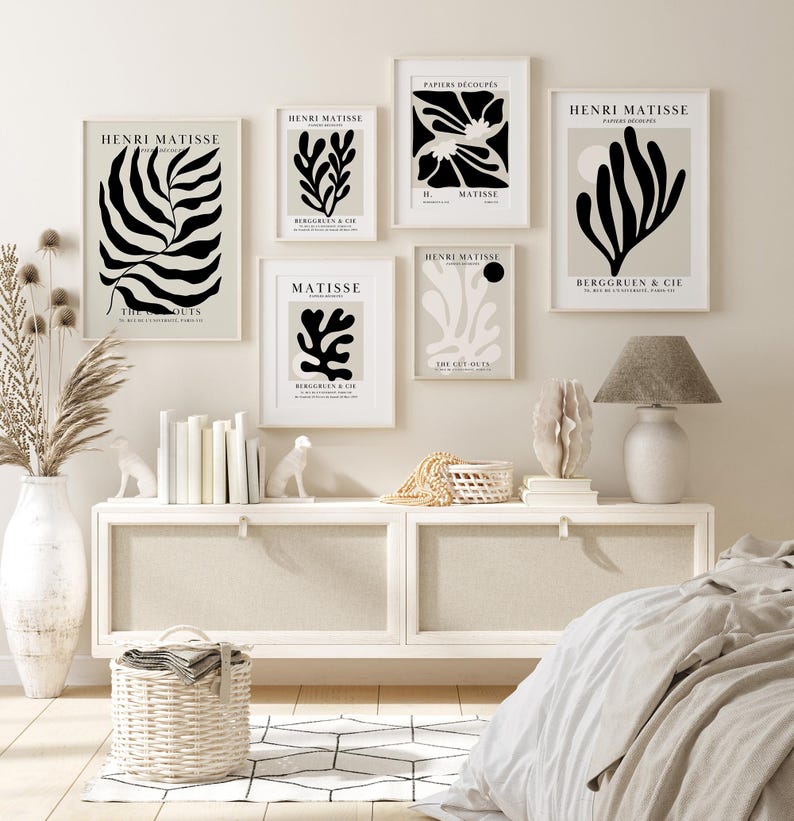 Set of 12 Henri Matisse inspired printable posters in striking black and beige tones, featuring minimalist abstract forms, geometric modern art, and subtle abstract flowers. This mid century modern Matisse gallery wall set combines bold black shapes with warm beige backgrounds for a refined, timeless look. Ideal for minimalist black art lovers, neutral boho interiors, and modern spaces, these coordinated prints bring balance and artistic character to living rooms, bedrooms, offices, or entryways