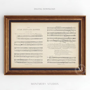 May include: A framed vintage print of The Star Spangled Banner sheet music. The document features musical notation and lyrics in black ink on an aged, off-white paper background, enclosed within a dark brown wooden frame with a black inner border.