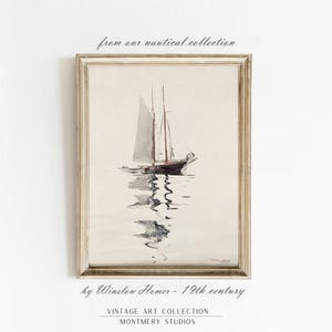 May include: A framed watercolor painting of a sailboat on the water. The painting is by Winslow Homer and is from the 19th century. The painting is in a light wood frame.