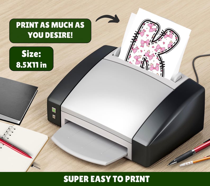 May include: A printer is shown with a printed sheet featuring a letter "K" decorated with pink bows. The text "PRINT AS MUCH AS YOU DESIRE!" and "SUPER EASY TO PRINT" are displayed. The paper size is 8.5x11 inches.