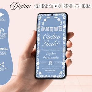 May include: A smartphone screen shows a digital animated invitation with the words "Cielito Lindo" in a floral design. The invitation is for a baby shower, with the name Sophia Hernandez and event details. The phone is held in a hand.