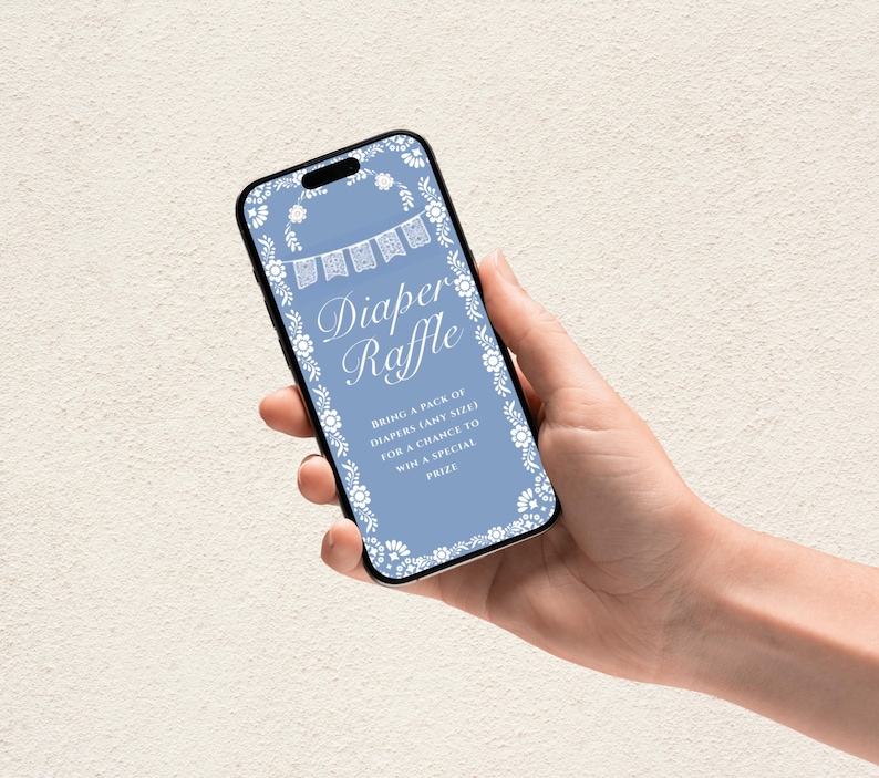 May include: A smartphone screen shows a baby shower invitation for a diaper raffle. The screen has a light blue background with white floral and banner accents. The text reads "Diaper Raffle" and details about the raffle.