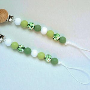 Ferma ciuccio con fiore verde e bianco/ Ferma ciuccio per neonato/ Regalo per baby shower/ Porta ciuccio/ Ferma ciuccio per neonato/ Ferma ciuccio per bambina
