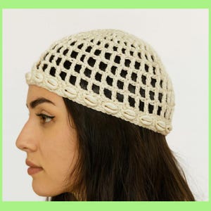 berretto a rete all'uncinetto