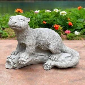 Concrete otter figurine animal garden art Stone otter on log Wildlife decoration Animal lover gift Outdoor ornament