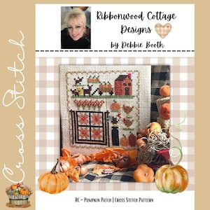 May include: A cross-stitch pattern featuring a pumpkin patch scene with a house, pumpkins, and chickens. The design is surrounded by fall foliage and pumpkins. The text reads "Ribbonwood Cottage Designs by Debbie Booth" and "RC - Pumpkin Patch | Cross Stitch Pattern."
