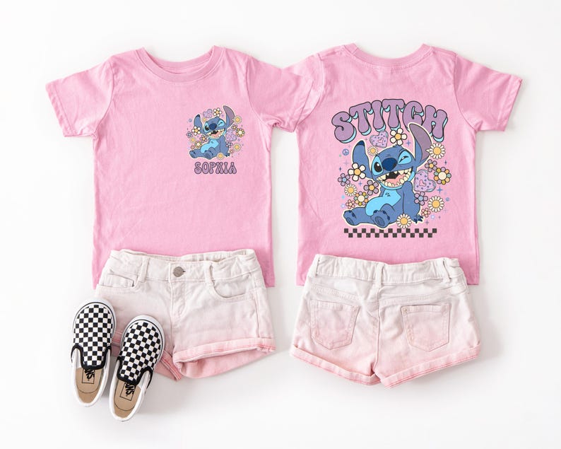 A pink t-shirt with a cartoon character and the word "STITCH" printed on it, along with a pair of white shorts and checkered shoes.