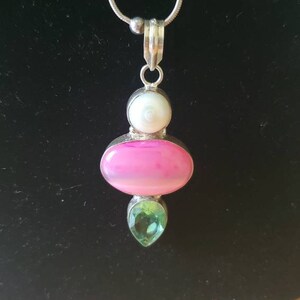 Sterling wrapped, mother of pearl, peridot, and rhodochrosite, charm on bead ball,  Sterling 24 inch necklace.  Gift, birthday, anniversary.