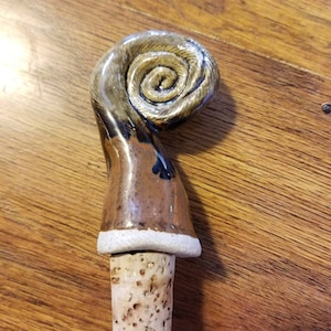 Handmade ceramic wine/bottle stopper.