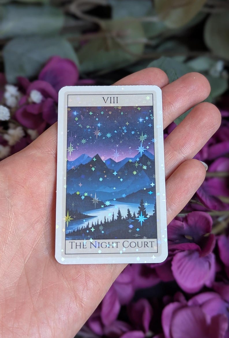 May include: A tarot card with a blue and purple mountain scene under a starry night sky. The card is labeled "VIII THE NIGHT COURT".