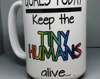 Goals today, keep the tiny humans alive, rainbow, coffee mug.