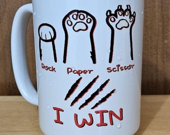 Cat, rock paper scissors, I win. 11 or 15oz coffee mugs