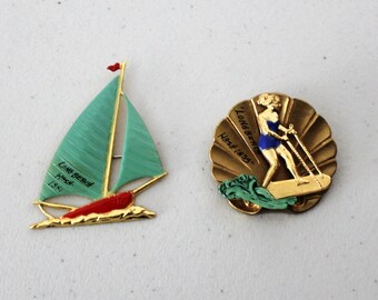 Lot of 2 Long Beach Wash. 1939 1941 Pins Brooch, Girl Skiing, Sailing, Boat, Catamaran, Wa State