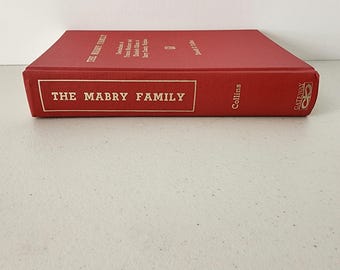May include: A red hardcover book titled The Mabry Family with gold lettering on the spine and front cover. The spine displays the title, the author Collins, and a Gateway logo. The front cover includes the title in a rectangular border.