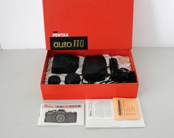 Pentax Auto 110 Camera System in Box with Kit Flash, Film Winder, Lenses