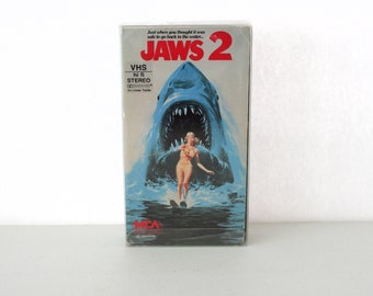 Jaws 2 VHS in Clear Case, Original Red MCA Home Video , Hi Fi Stereo Sticker