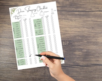 May include: A white checklist with black text and checkboxes for planning a wedding dress shopping trip. The checklist includes categories for style, neckline, and details. The text includes "wedding date", "budget", "A-Line", "Ballgown", "Fit", "Lace", "Sweetheart", "Strapless", "V-neck", "Off the shoulder", "High neck", "Scoop", "Glitter", "Beading", "Sleeves", "Over skirt", "Corset", "Sheer bodice", "Long train", "Low back", "High waist", "Back bustle", "Crepe", "Tulle", "Mikado", "Satin/Silk", "Ivory", "White", "Blush", "Champagne", "Romantic", "Sexy", "Boho", "Simple", "Timeless", "Elegant", "Modern", "Whimsical".