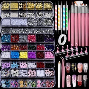 May include: A comprehensive nail art kit featuring a multi-compartment clear plastic organizer filled with assorted metallic charms, rhinestones, and beads. Includes a set of pink-handled brushes, dotting tools, tweezers, a wax pencil, tape, and display stands.