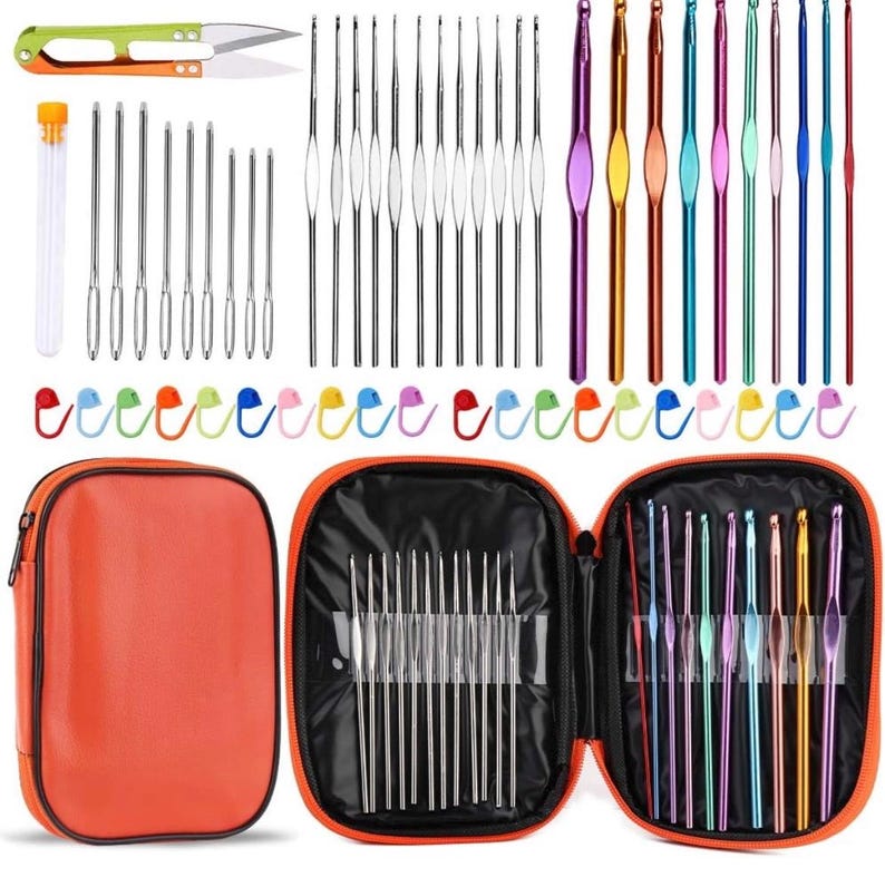 May include: An orange zippered case containing a crochet hook set. The set includes various sizes of silver crochet hooks, colorful aluminum crochet hooks, yarn needles, stitch markers, and a pair of green and orange scissors.
