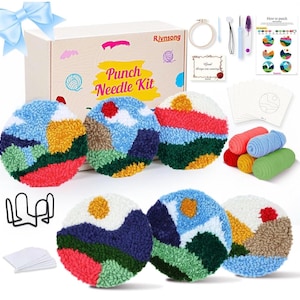 May include: A punch needle kit with a wooden box, featuring colorful, textured circular designs resembling landscapes. The kit includes yarn, needles, a hoop, and instructions. A blue bow adorns the top left corner.