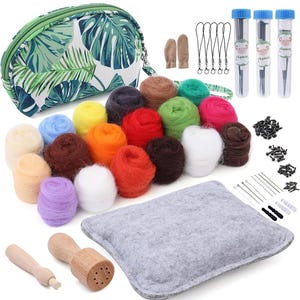 May include: A felting kit with a variety of colored wool, felting needles, a felting tool, and a small gray felt mat. The kit also includes a small green and white floral print bag, a pair of finger cots, and a set of three clear tubes with felting needles.